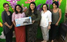 Third Story Project founders receiving printer donation from WBFN